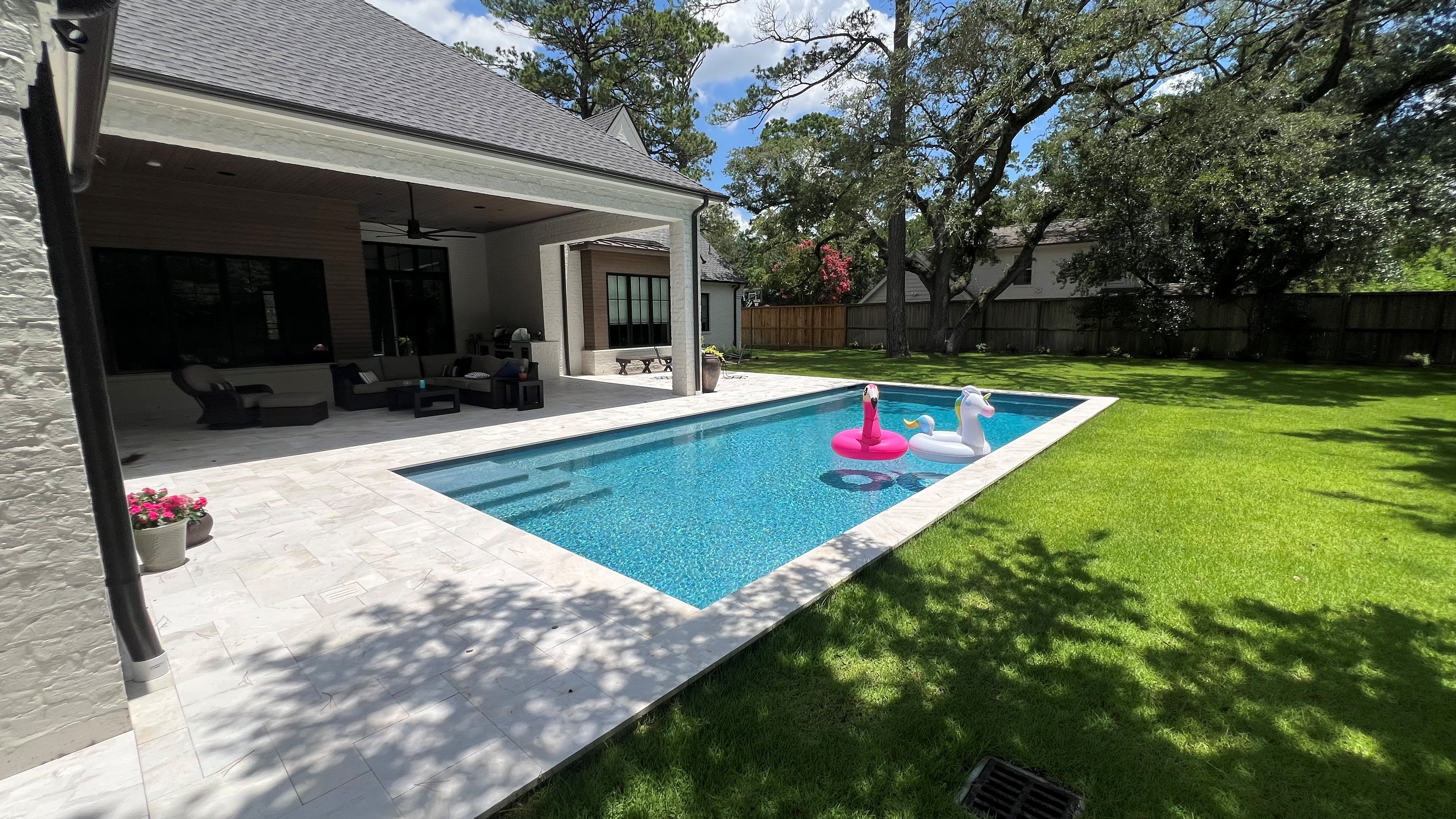 Concrete pool cost The Woodlands – Texas Pools family pool.
