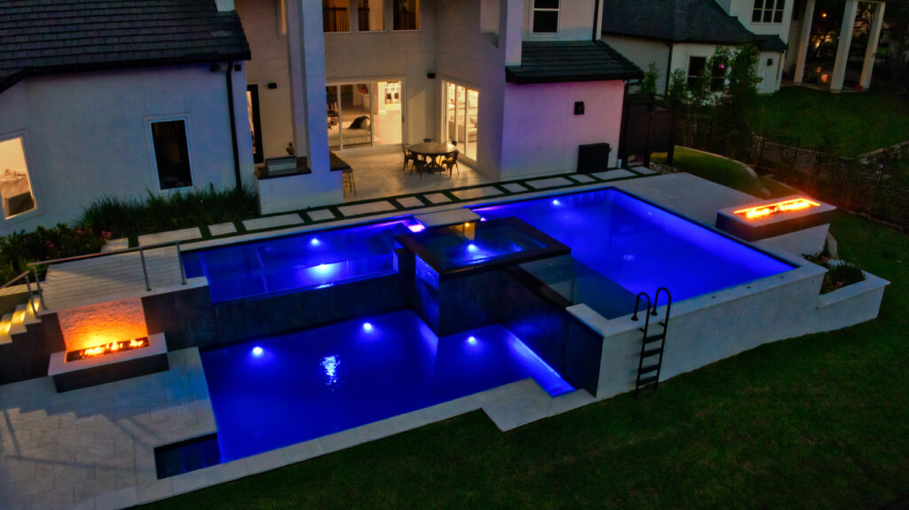 Texas Pools Inc. Energy-efficient pool with LED lighting in Magnolia, Texas.